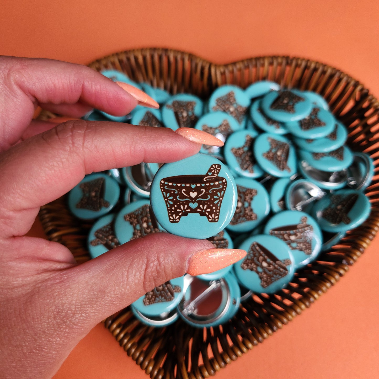 pin-back buttons of a mexican molcaje